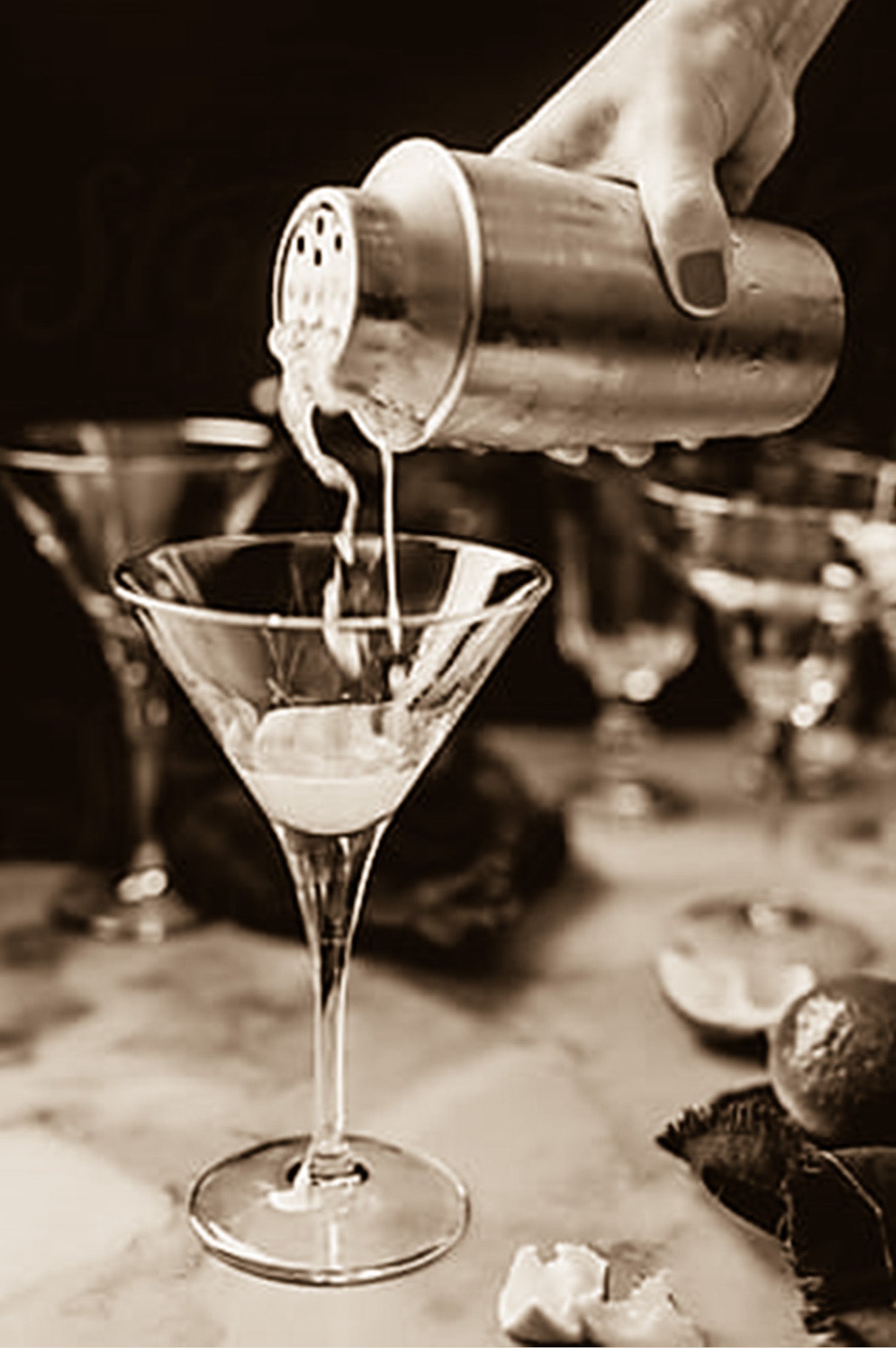 Bartender pouring martini